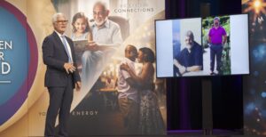 Gundry on stage with old image–975A0856